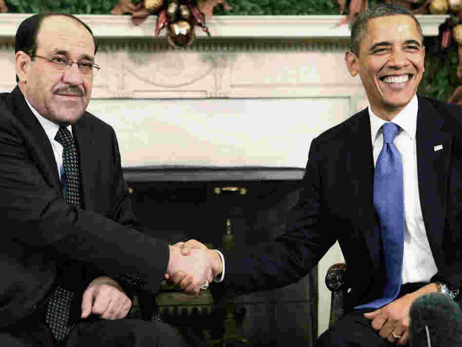 Iraqi Prime Minister Nouri al-Maliki shook hands with President Obama in the Oval Office at the White House earlier today (Dec. 12, 2011).