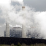 Piles of coal are shown at NRG Energy's W.A. Parish Electric Generating Station in Thompsons, Texas. The U.S. Environmental Protection Agency will begin regulating mercury emissions from coal-fired power plants for the first time.