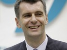 Russian tycoon Mikhail Prokhorov at a news conference in Moscow on Monday announcing he will challenge Prime Minister Vladimir Putin in next March's presidential election. Russian tycoon Mikhail Prokhorov at a news conference in Moscow on Monday announcing he will challenge Prime Minister Vladimir Putin in next March's presidential election.