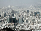 In this Jan. 5, 2010 file photo, buildings and houses are covered with snow in Seoul, South Korea. June 25, 2010 marks the 60 anniversary of the Korean War. In this Jan. 5, 2010 file photo, buildings and houses are covered with snow in Seoul, South Korea. June 25, 2010 marks the 60 anniversary of the Korean War.