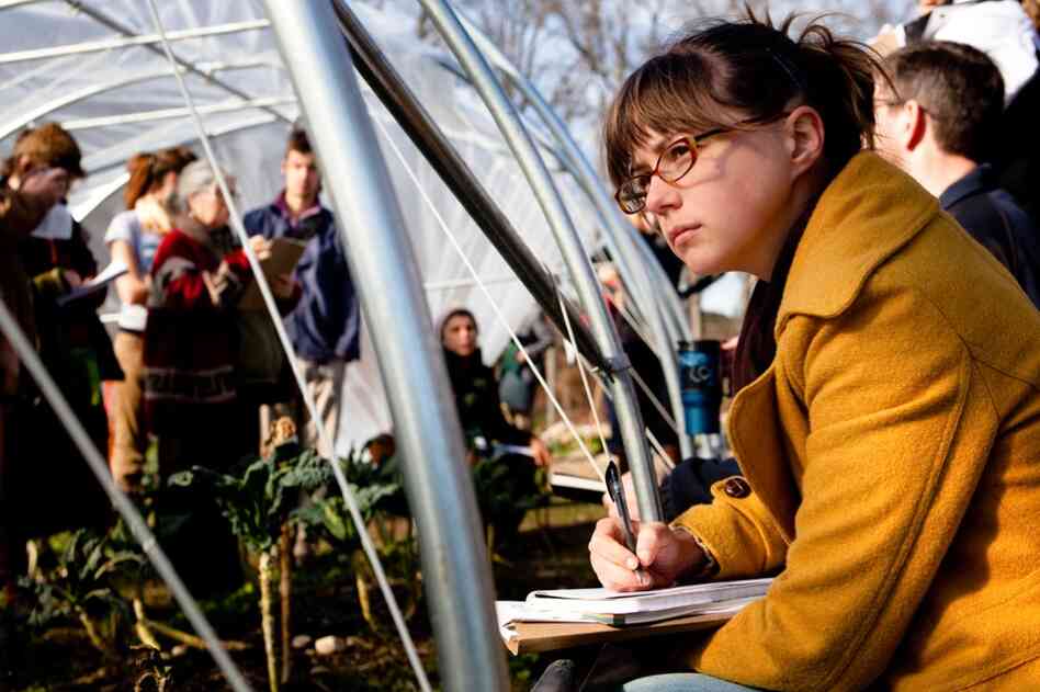 Maryland farmer Josie Johnson learns about extending the farming season by growing crops under caterpillar tunnels. The lecture was part of a conference for young farmers held in Tarrytown N.Y., in early December. 
