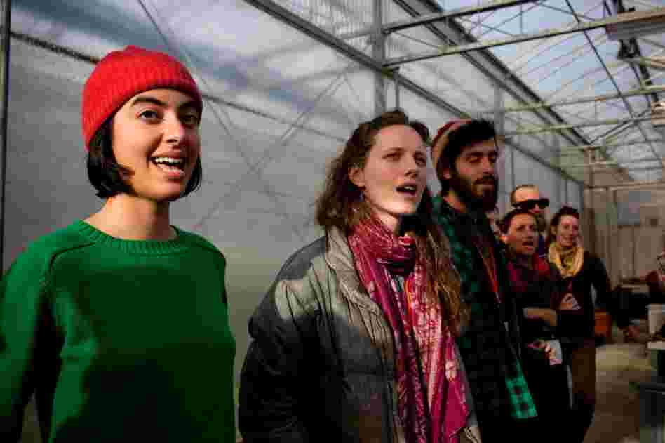 From left: Mitra Sticklen, Rachel Fleury and Nate Kraus-Malett learn traditional farming work songs.