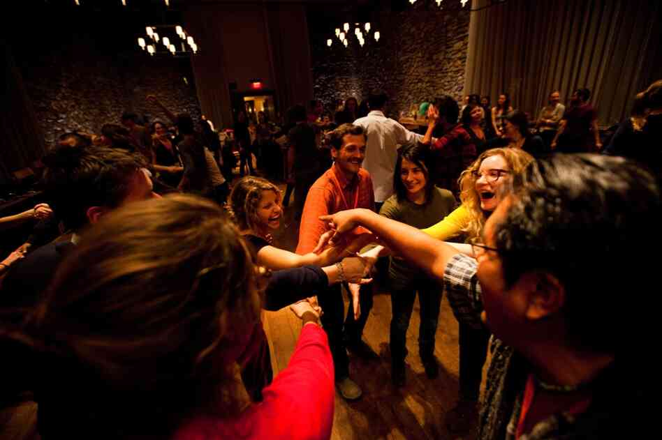 Young farmers let loose during a contra dance, a type of line-dancing.