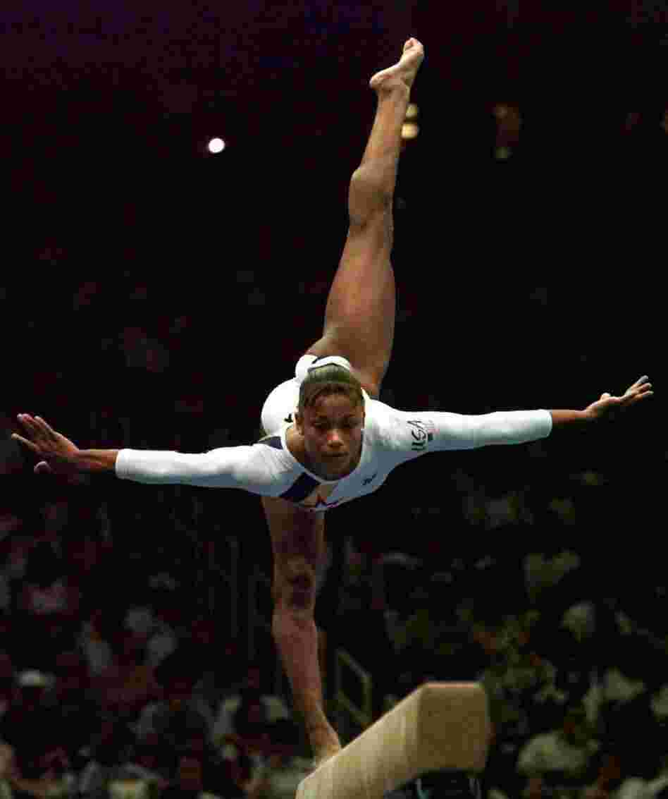 Dawes performs her balance beam routine at the Atlanta Games in 1996.