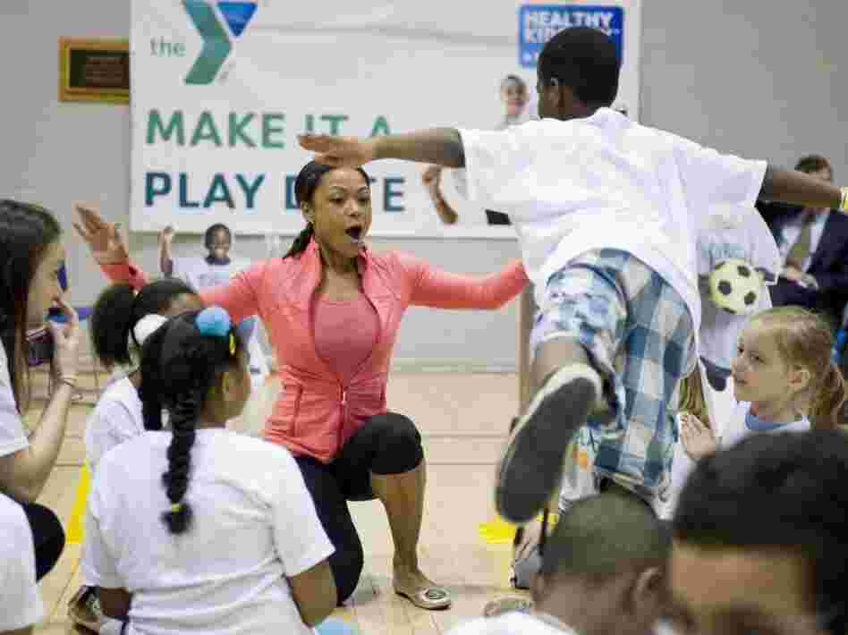 Dominique Dawes encourages kids to get 60 minutes of active play every day as part of the kick off of YMCA's Healthy Kids Day in April 2011.