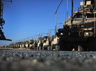 A day after leaving Iraq last week, U.S. Army soldiers from the 1st Cavalry Division lined up their armored vehicles near Kuwait City, Kuwait. Armored equipment will not stay behind after troops leave Iraq, but other property may. A day after leaving Iraq last week, U.S. Army soldiers from the 1st Cavalry Division lined up their armored vehicles near Kuwait City, Kuwait. Armored equipment will not stay behind after troops leave Iraq, but other property may.