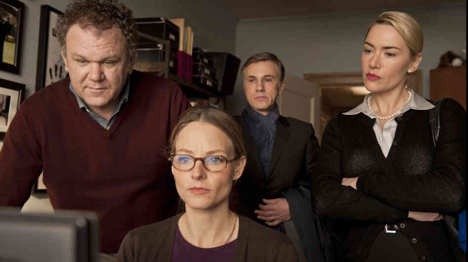 What Happened Here: Two couples (from left, John C. Reilly, Jodie Foster, Christoph Waltz and Kate Winslet) reconstruct a playground incident that ended in bloodshed. What Happened Here: Two couples (from left, John C. Reilly, Jodie Foster, Christoph Waltz and Kate Winslet) reconstruct a playground incident that ended in bloodshed.