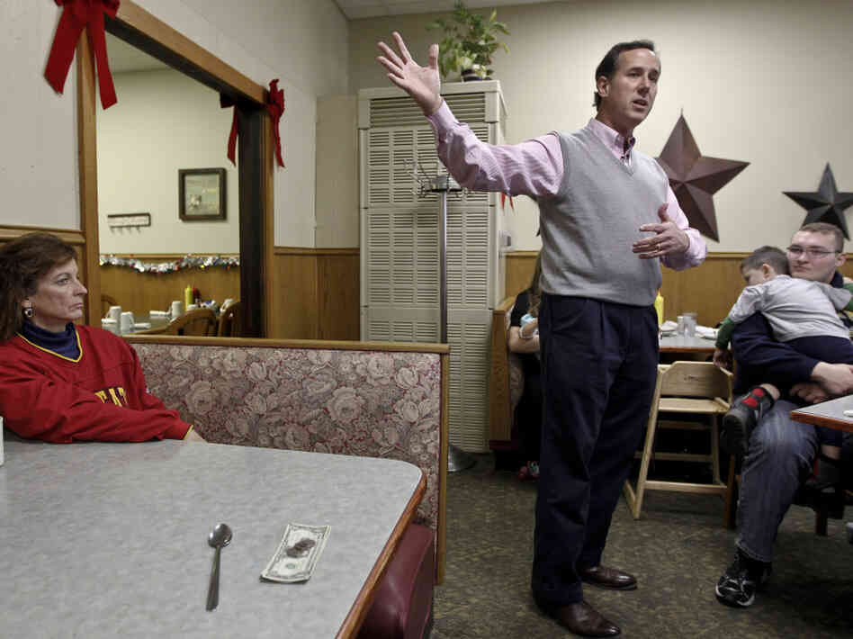 Former Pennsylvania Sen. Rick Santorum speaks Tuesday at the Lincoln Cafe in Belle Plaine, Iowa. Among GOP candidates, Santorum had the state to himself on Tuesday.