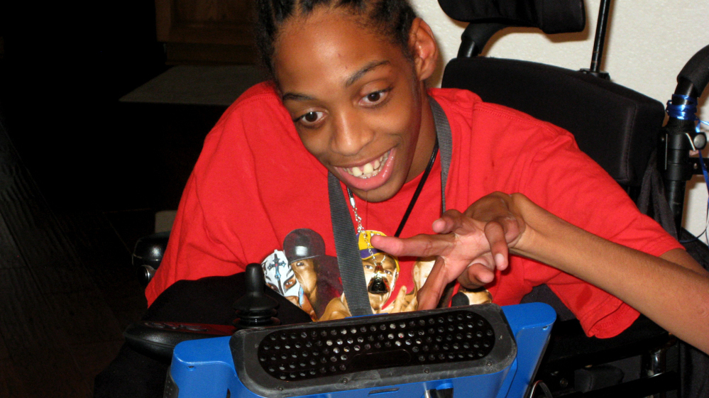  Tres Whitlock types on the DynaVox tablet that serves as his voice. Whitlock, 17, has cerebral palsy and can't speak on his own. He is trying to enroll in a Hillsborough County charter school, but has yet to enroll because of concerns about the therapy and services he needs. 