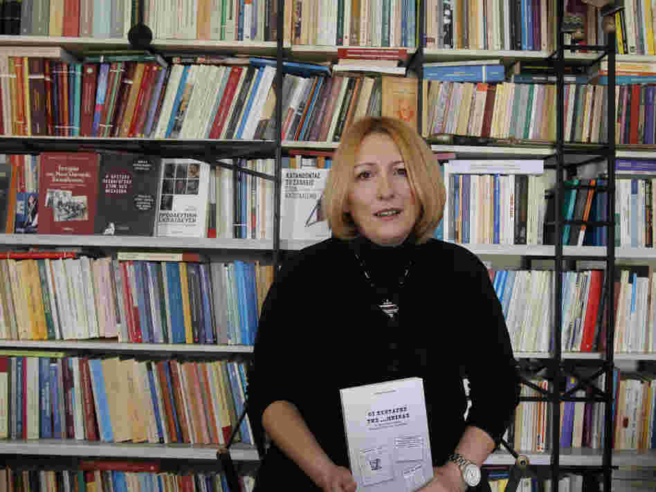 Historian and cookbook author Eleni Nikolaidou with her book Starvation Recipes. Recession-hit Greeks are fascinated with the book's World War II-era survival tips and recipes.