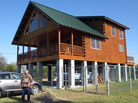Gerald Brady, a former shipyard welder, built this log cabin on eight-foot-high concrete piers. Gerald Brady, a former shipyard welder, built this log cabin on eight-foot-high concrete piers.