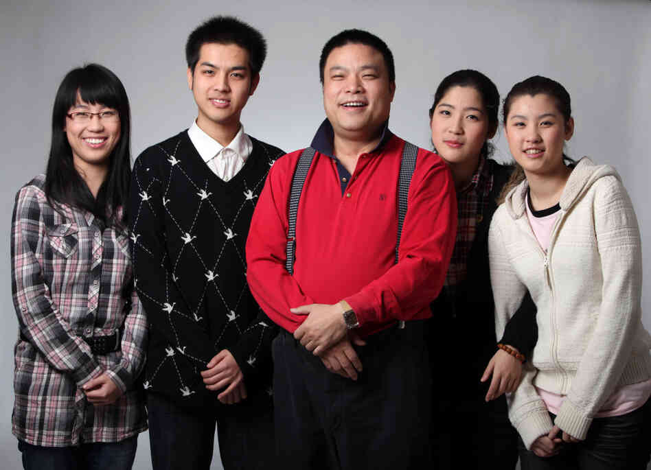 Wolf Dad Xiao Baiyou is shown in this publicity image with his four children, three of whom go to Peking University. He believes this is due to his method of beating his kids. The youngest is 16 and is hoping to study music at China's Central Conservatory of Music. Wolf Dad Xiao Baiyou is shown in this publicity image with his four children, three of whom go to Peking University. He believes this is due to his method of beating his kids. The youngest is 16 and is hoping to study music at China's Central Conservatory of Music.