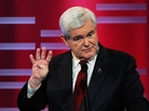 Former Speaker of the House Newt Gingrich, seen here during Saturday's ABC debate, is currently leading in GOP polls. His tax plan would introduce a 15 percent flat income tax. Former Speaker of the House Newt Gingrich, seen here during Saturday's ABC debate, is currently leading in GOP polls. His tax plan would introduce a 15 percent flat income tax.