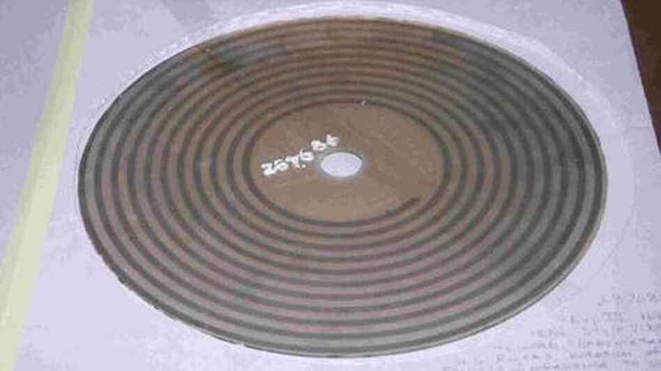 A large glass photodisc from the Smithsonian collection of early sound recordings. A large glass photodisc from the Smithsonian collection of early sound recordings.