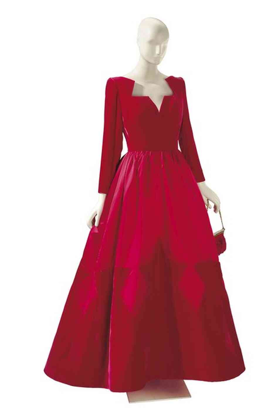 A velvet and satin Valentino ball gown with a matching satin evening bag.