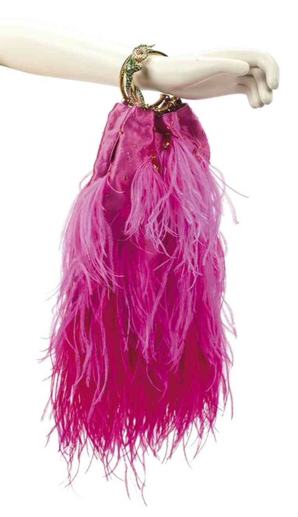 A Valentino evening bag made from satin, beads and feathers, thought to be worth around $500-700.
