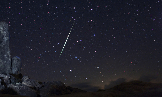In this picture provided by Wally Pacholka of AstroPics.com, a Geminid fireball explodes over the Mojave Desert in the Jojave Desert, Calif. on Dec. 13, 2009.