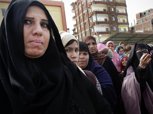 Women stand in line to cast their votes in Suez, Egypt, on Wednesday. For months after the revolution, the port city had no government or services. Some voters are turning to the Salafists or the Muslim Brotherhood to bring change. Women stand in line to cast their votes in Suez, Egypt, on Wednesday. For months after the revolution, the port city had no government or services. Some voters are turning to the Salafists or the Muslim Brotherhood to bring change.