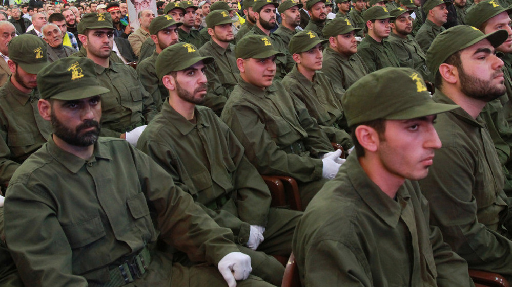 Hezbollah members listen to a speech by the group's leader, Â Hassan Nasrallah, via video-link in the southern suburbs of Beirut on Nov. 11, 2011.