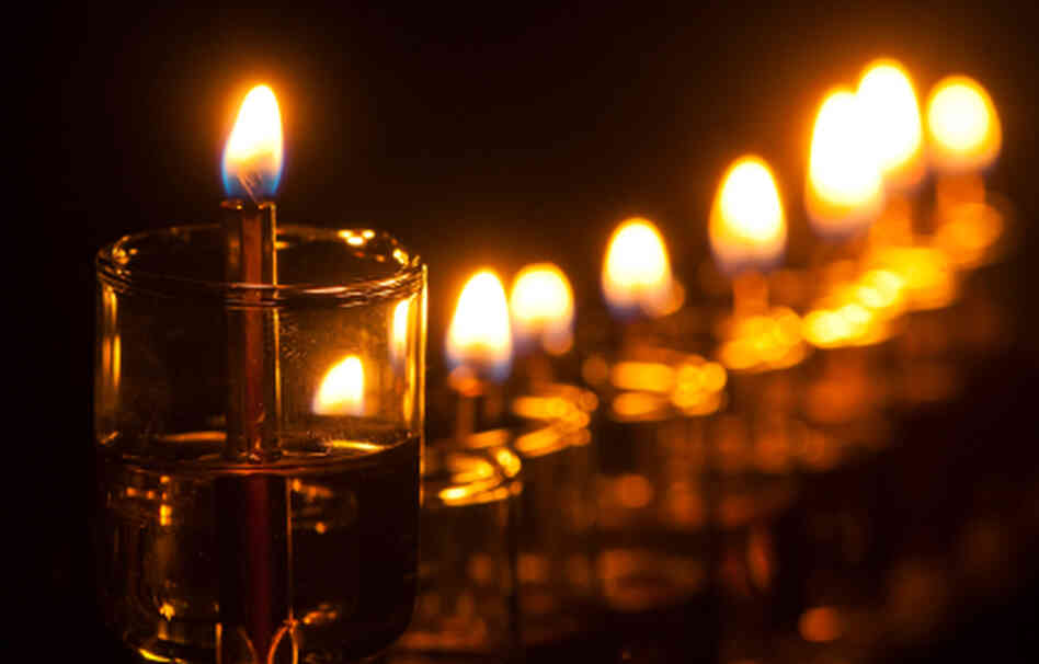A Hanukkah menorah. A Hanukkah menorah.