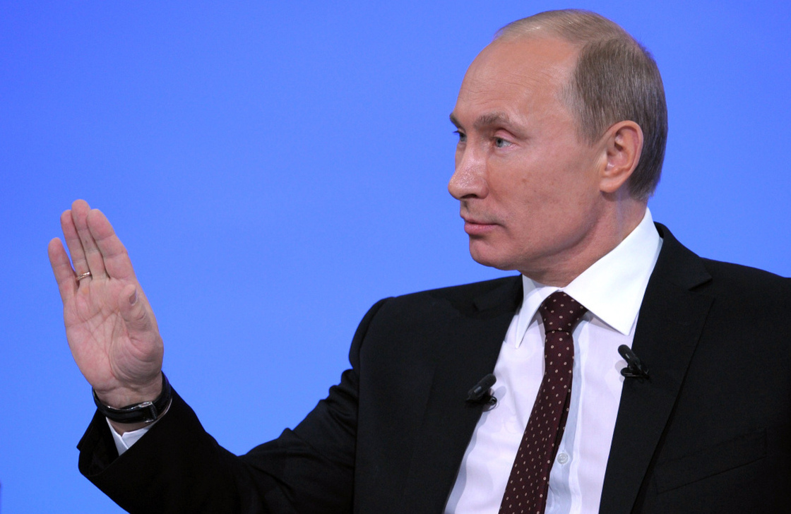 Russia's Prime Minister Vladimir Putin gestures during his annual phone-in session with Russians in Moscow.