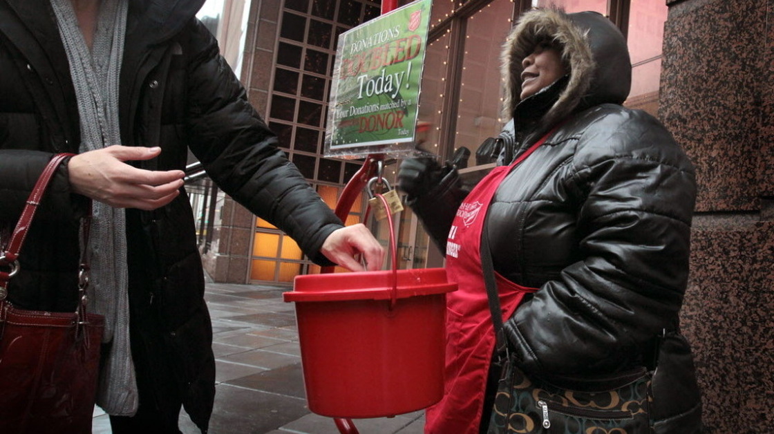 In Chicago: Antionette Levi rings her bell as she solicits donations for the Salvation Army.