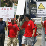 Metropolitan State Hospital employees and supporters gathered outside the hospital in Norwalk, Calif., this summer to protest repeated assaults at the hands of mental patients, and what they called dangerous working conditions.