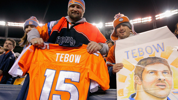 Fans show their support of quarterback Tim Tebow. 