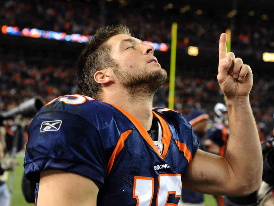  Tebow celebrates after the game against the New York Jets on Nov. 17, 2011 in Denver. 
