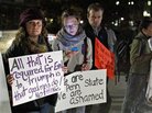 Students stand outside Penn State's Old Main building, protesting the handling of a child abuse scandal involving retired Penn State assistant football coach Jerry Sandusky. Students stand outside Penn State's Old Main building, protesting the handling of a child abuse scandal involving retired Penn State assistant football coach Jerry Sandusky.