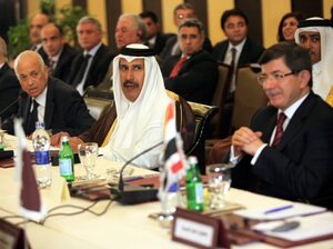 Arab League Secretary General Nabil Al Arabi (far left) meets with foreign ministers of the Arab League in Cairo on Nov. 27. The group imposed tough sanctions against Syria at that meeting, but is now wavering when it comes to implementing them. Arab League Secretary General Nabil Al Arabi (far left) meets with foreign ministers of the Arab League in Cairo on Nov. 27. The group imposed tough sanctions against Syria at that meeting, but is now wavering when it comes to implementing them.