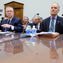 On Dec. 9, 2008, former Freddie Mac CEO Richard Syron (left) and former Fannie Mae CEO Daniel Mudd wait to testify on Capitol Hill in Washington. The Securities and Exchange Commission has brought civil fraud charges against six former top executives at Fannie Mae and Freddie Mac, including Syron and Mudd.