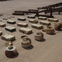U.S. and Iraqi soldiers display "sticky IEDs"  — magnetic bombs that militants attach to vehicles — found during a raid at a checkpoint near the Iraq-Iran border.