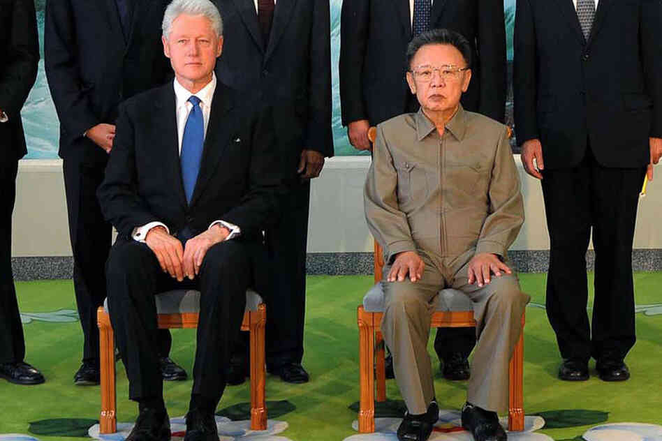 Aug. 4, 2009: Kim Jong Il (right) poses with former U.S. President Bill Clinton in Pyongyang. 