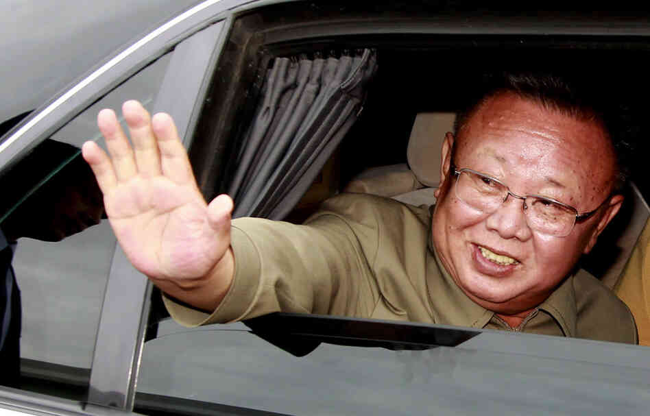 Aug. 24, 2011: Kim Jong Il waves from his car after a meeting with Russian President Dmitry Medvedev in Siberia for secrecy-shrouded talks on energy and food aid.  