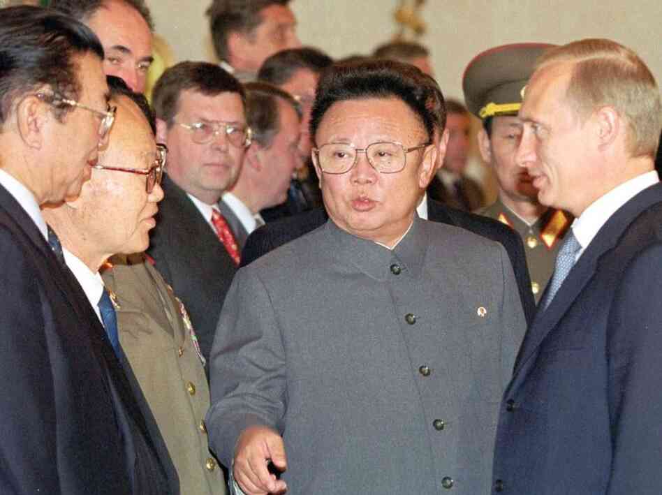 Kim Jong Il is seen here while introducing members of his delegation to Russian President Vladimir Putin.