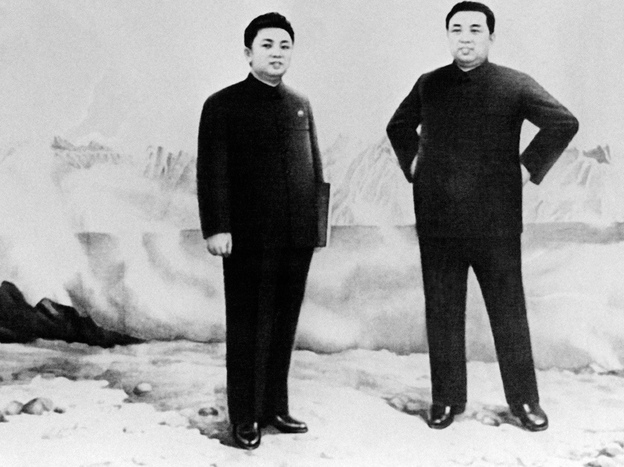 An undated official picture shows former North Korean leader Kim Il Sung (right) with his son and eventual successor Kim Jong Il. 