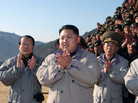 Kim Jong Un, who is expected to become North Korea's next leader, claps after inspecting the construction site of a power station. This undated photo was released by the Korean Central News Agency on Nov. 4, 2010. Kim Jong Un, who is expected to become North Korea's next leader, claps after inspecting the construction site of a power station. This undated photo was released by the Korean Central News Agency on Nov. 4, 2010.