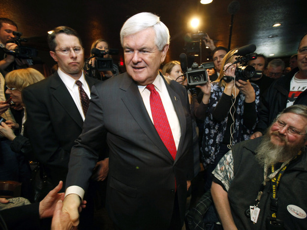 Republican presidential candidate Newt Gingrich greets local residents after speaking at the Willow Ridge Golf Course on Dec. 15 in Fort Dodge, Iowa.