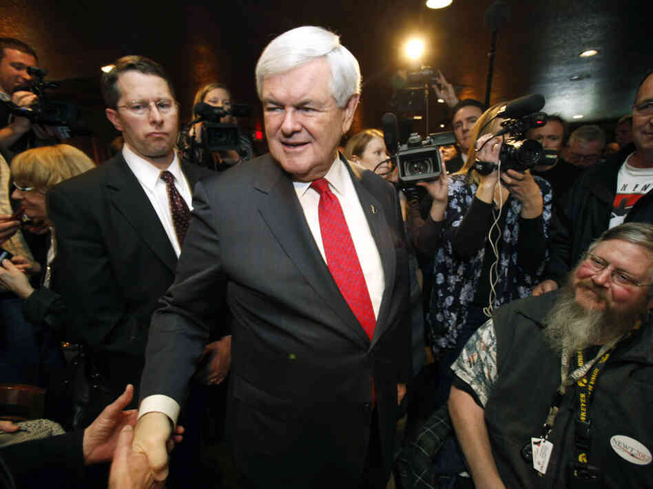 Republican presidential candidate Newt Gingrich greets local residents after speaking at the Willow Ridge Golf Course on Dec. 15 in Fort Dodge, Iowa.
