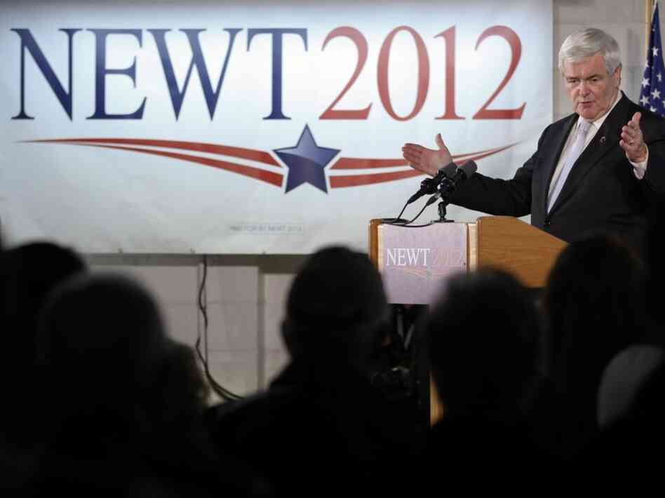 Newt Gingrich speaks Monday at Global Security Services in Davenport, Iowa. Despite falling poll numbers, Gingrich says he will avoid negative campaigning.