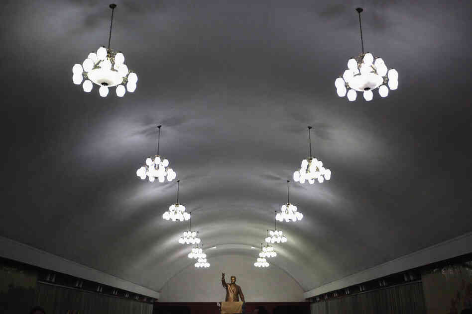 A bronze statue of Kim Il Sung, one of many around the country, is in the Yongwang subway station.
