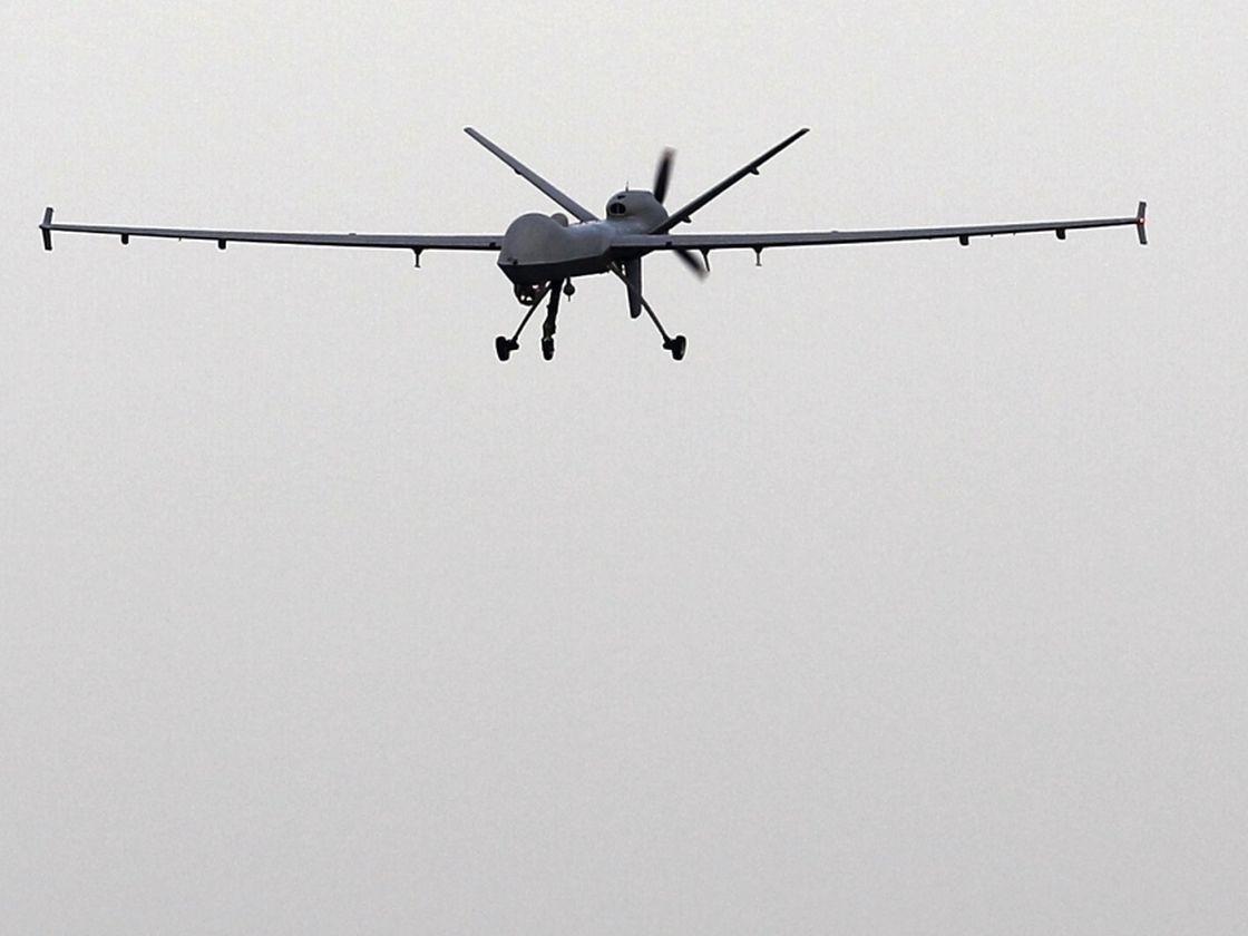 A Predator B unmanned aircraft returns to the Naval Air Station in Corpus Christi, Texas. U.S. Customs and Border Protection is expanding its use of drones to patrol U.S. borders.
