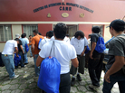 Honduran migrants deported from the United States wait to complete their paperwork as they return to their home country in August. Honduran migrants deported from the United States wait to complete their paperwork as they return to their home country in August.
