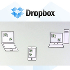 The cloud became a common term in 2011. Here, a screengrab from the Dropbox website shows how the cloud-based data storage service shares the same information on multiple devices.