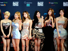 Korean pop group Girls' Generation pose on the red carpet to attend the MNET Asian Music Awards ceremony in Singapore in November. Korean pop group Girls' Generation pose on the red carpet to attend the MNET Asian Music Awards ceremony in Singapore in November.