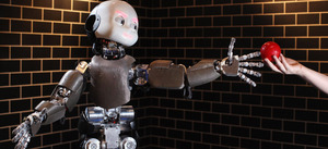 Robot technology made several advances in 2011. Here, an iCub robot built by the Italian Institute of Technology tracks and grabs a red ball at the Robotville exhibition, held in London.
