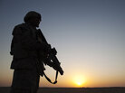 Specialist Dante Battle from the 3rd Brigade Combat Team, 1st Cavalry Division secures the perimeter outside of a Mine Resistant Ambush Protected (MRAP) vehicle on the way to cross the Kuwaiti border as part of the last U.S. military convoy to leave Iraq Sunday Dec. 18, 2011. Specialist Dante Battle from the 3rd Brigade Combat Team, 1st Cavalry Division secures the perimeter outside of a Mine Resistant Ambush Protected (MRAP) vehicle on the way to cross the Kuwaiti border as part of the last U.S. military convoy to leave Iraq Sunday Dec. 18, 2011.