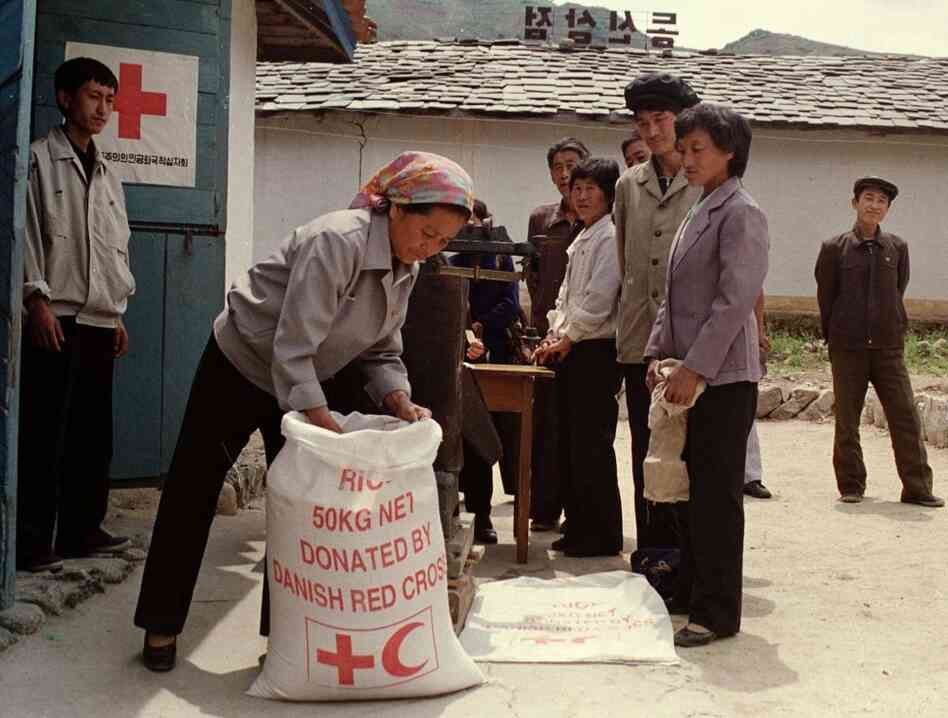 North Korean residents line up to receive food rations at a Red Cross distribution center in Tongsin, North Korea, in 1997. Discussions over U.S. food aid to the reclusive country were to take place Monday. "You could, in a very real sense, see the needs for food assistance," said an official with Mercy Corps, after a September 2011 visit to the country. North Korean residents line up to receive food rations at a Red Cross distribution center in Tongsin, North Korea, in 1997. Discussions over U.S. food aid to the reclusive country were to take place Monday. "You could, in a very real sense, see the needs for food assistance," said an official with Mercy Corps, after a September 2011 visit to the country.