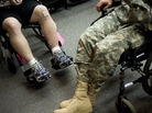 Sgt. Jonathan Madonna and Spc. Michael Schumm were wounded in Iraq. They were awarded the Purple Heart in May 2007. Sgt. Jonathan Madonna and Spc. Michael Schumm were wounded in Iraq. They were awarded the Purple Heart in May 2007.